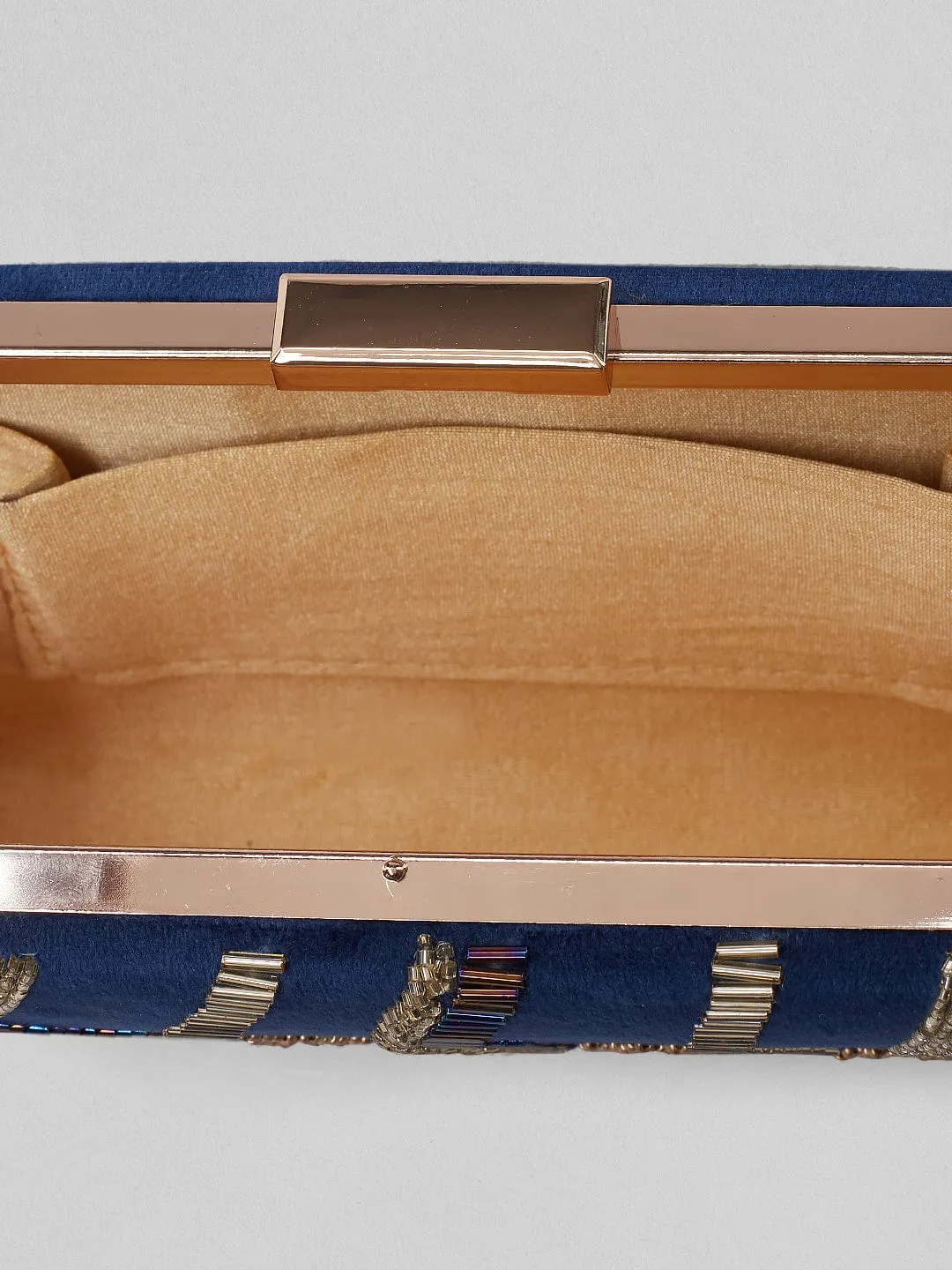 Rubans Blue Colour Box Clutch With Embroided Gold Design.